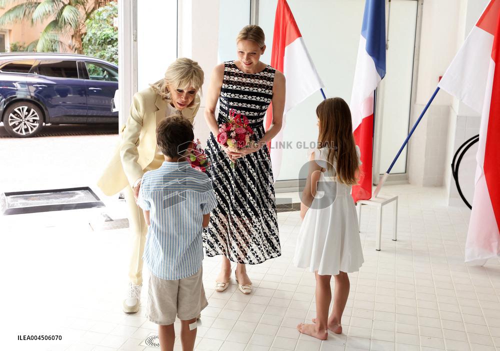 NO TABLOIDS - Brigitte Macron and Princess Charlene at the Water Safety Day Event