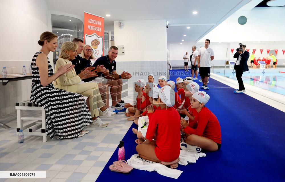 NO TABLOIDS - Brigitte Macron and Princess Charlene at the Water Safety Day Event