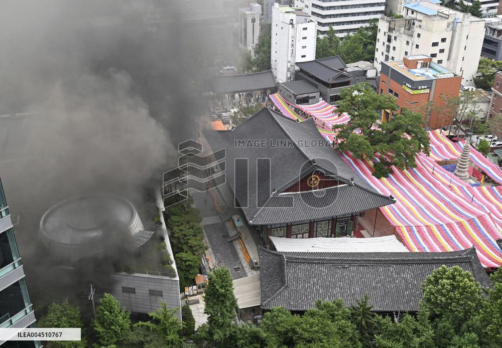 Fire at building near Buddhist temple in Seoul