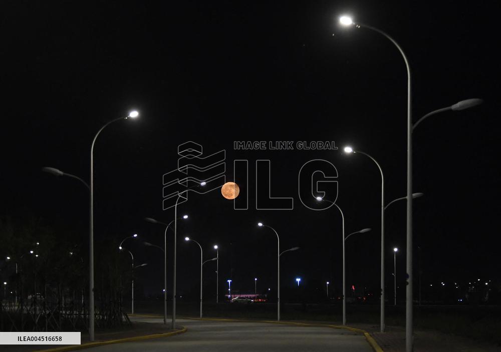 Strawberry Moon Over China
