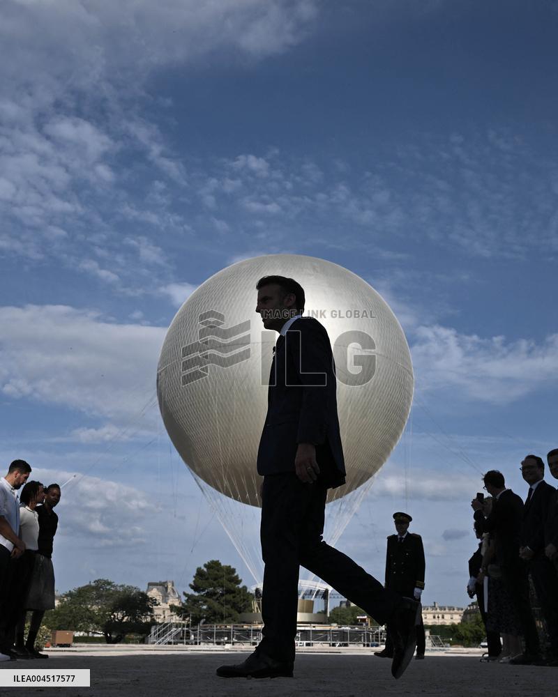 Macron Visits The Olympic Cauldron Reinstallation Site - Paris
