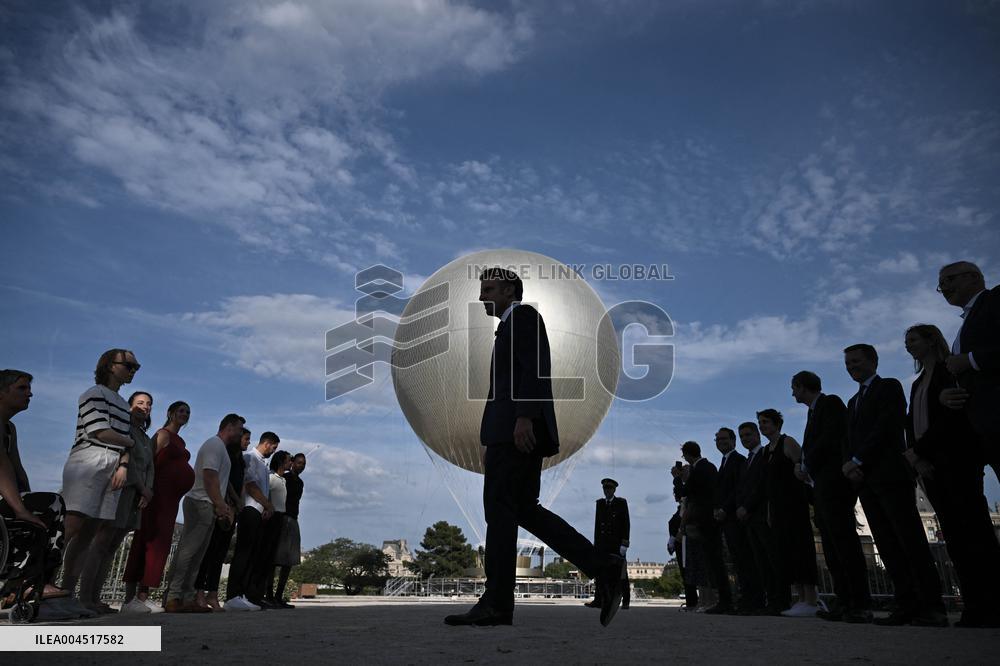 Macron Visits The Olympic Cauldron Reinstallation Site - Paris