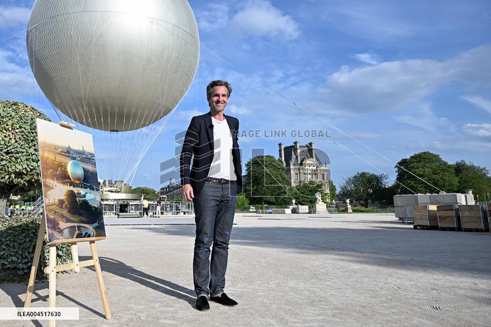 Macron Visits The Olympic Cauldron Reinstallation Site - Paris