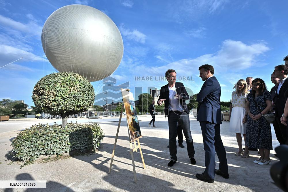 Macron Visits The Olympic Cauldron Reinstallation Site - Paris