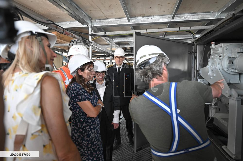 Macron Visits The Olympic Cauldron Reinstallation Site - Paris