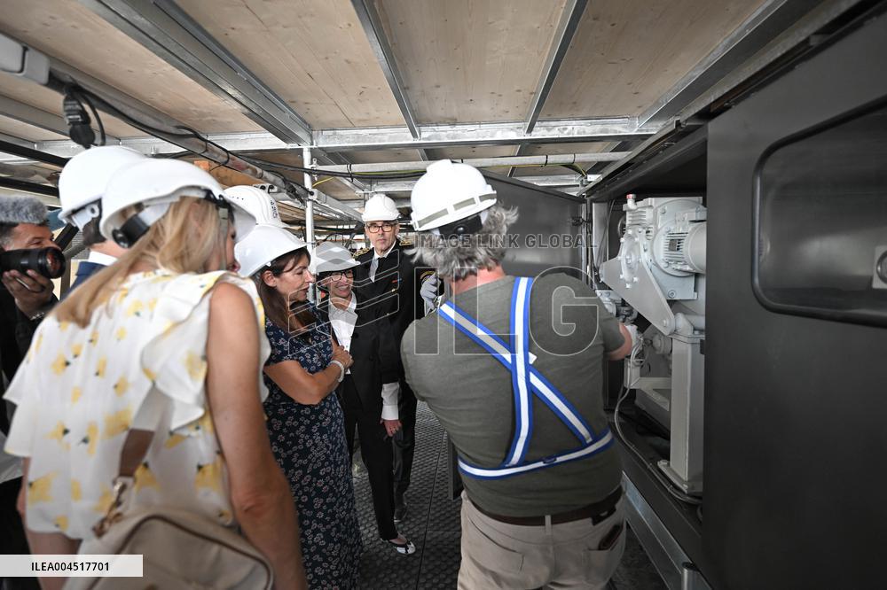Macron Visits The Olympic Cauldron Reinstallation Site - Paris