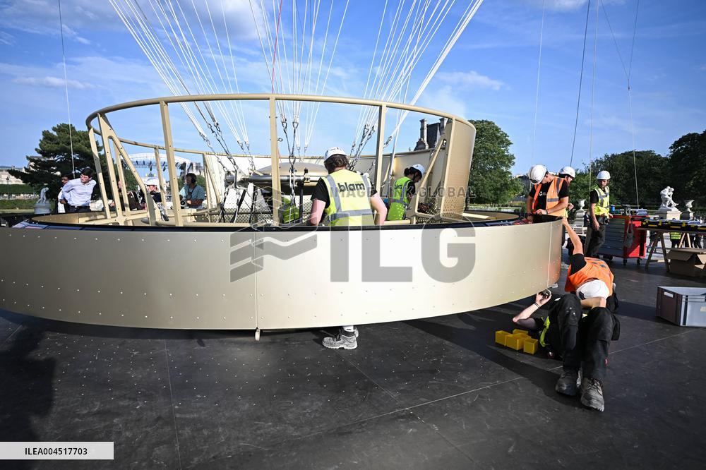 Macron Visits The Olympic Cauldron Reinstallation Site - Paris