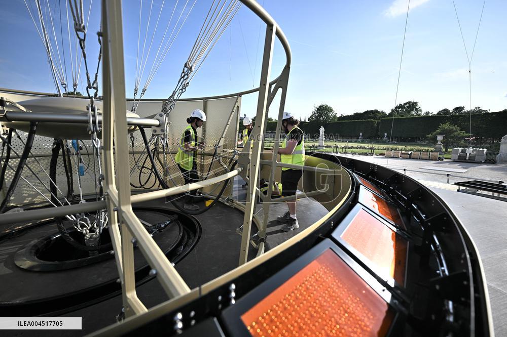 Macron Visits The Olympic Cauldron Reinstallation Site - Paris