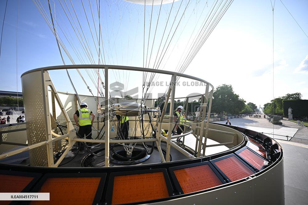 Macron Visits The Olympic Cauldron Reinstallation Site - Paris