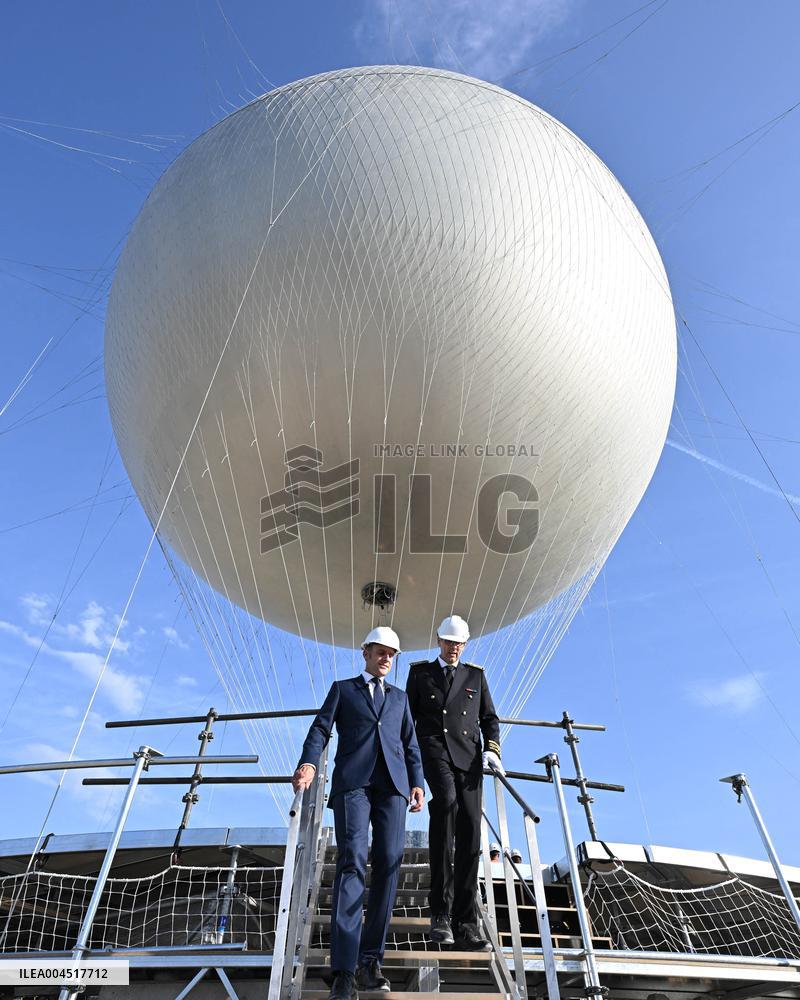 Macron Visits The Olympic Cauldron Reinstallation Site - Paris