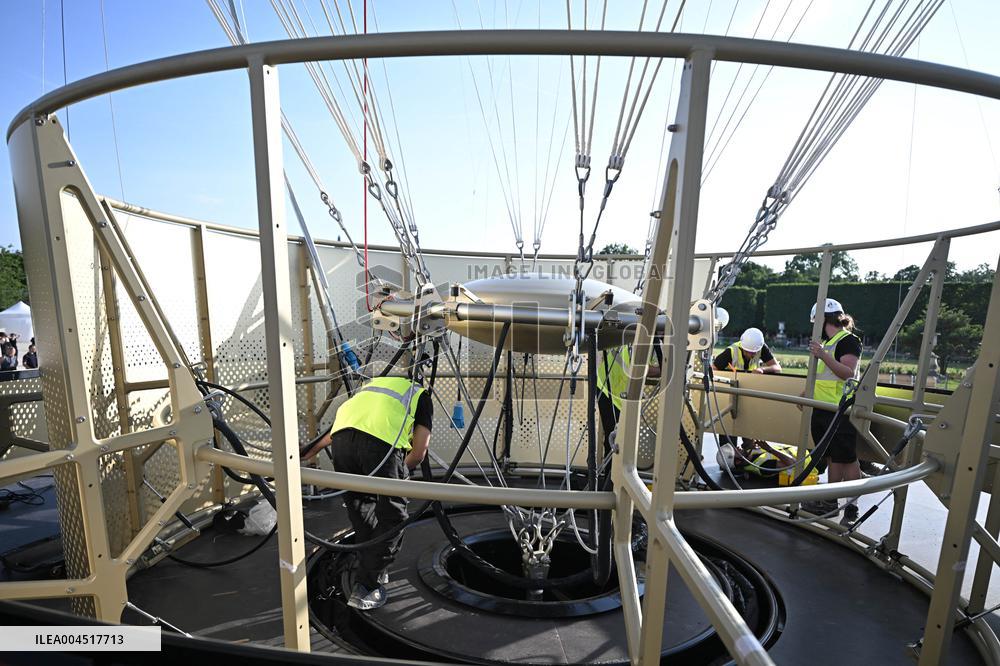 Macron Visits The Olympic Cauldron Reinstallation Site - Paris