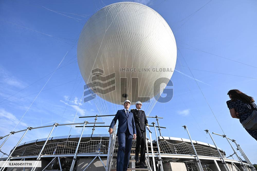 Macron Visits The Olympic Cauldron Reinstallation Site - Paris