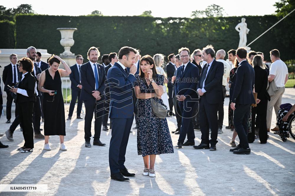Macron Visits The Olympic Cauldron Reinstallation Site - Paris