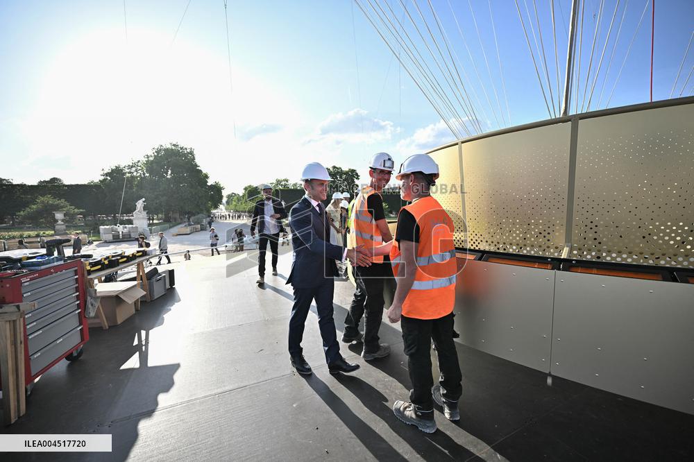 Macron Visits The Olympic Cauldron Reinstallation Site - Paris