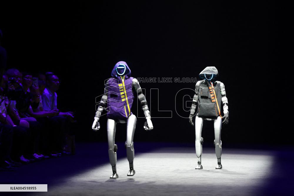 Humanoid Robots on Catwalk at Tianjin Fashion Week - China