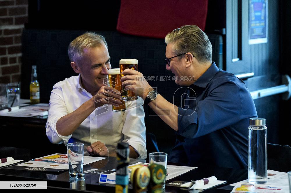 Carney And Starmer Watch Ice Hockey Match in Pub - Ottawa
