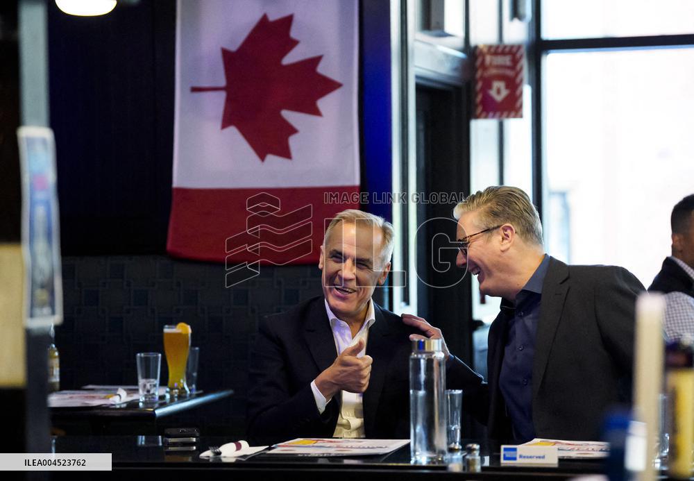 Carney And Starmer Watch Ice Hockey Match in Pub - Ottawa