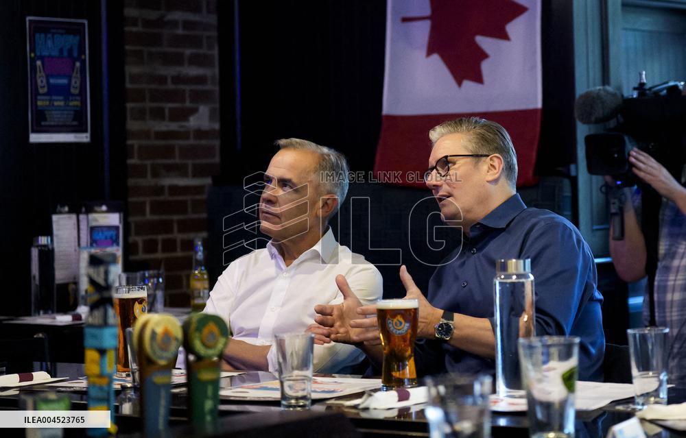 Carney And Starmer Watch Ice Hockey Match in Pub - Ottawa