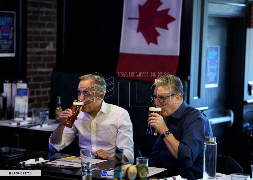 Carney And Starmer Watch Ice Hockey Match in Pub - Ottawa