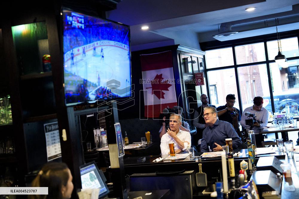 Carney And Starmer Watch Ice Hockey Match in Pub - Ottawa