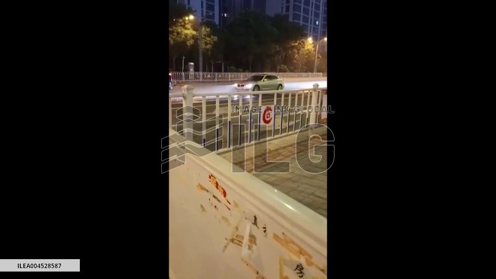 China: Localized Storm Splits Street in Half With Rain on One Side, Dry on the Other