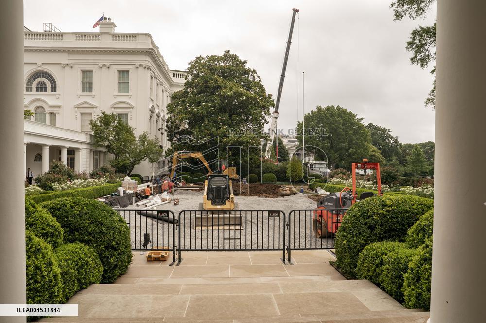 Workers Reconstruct the Rose Garden to Pavement at the White House