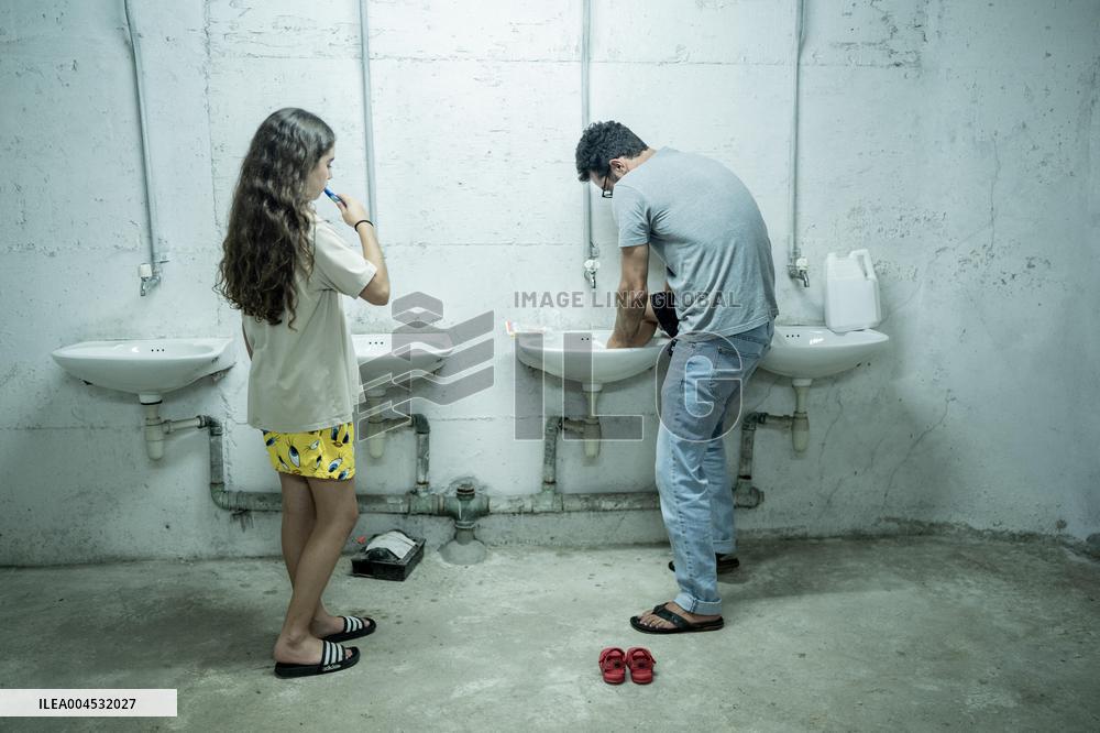 Israelis Shelter Underground Parking Lot - Tel Aviv