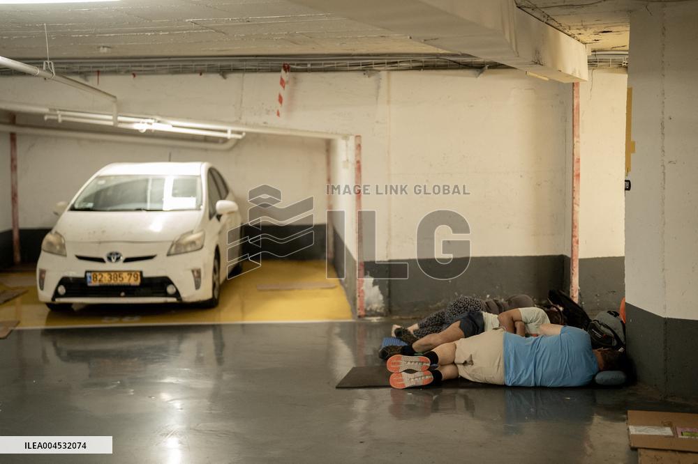 Israelis Shelter Underground Parking Lot - Tel Aviv