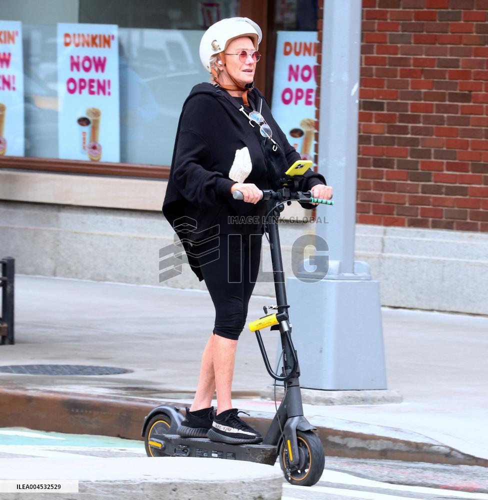 Deborra-Lee Furness Riding Her Scooter - NYC