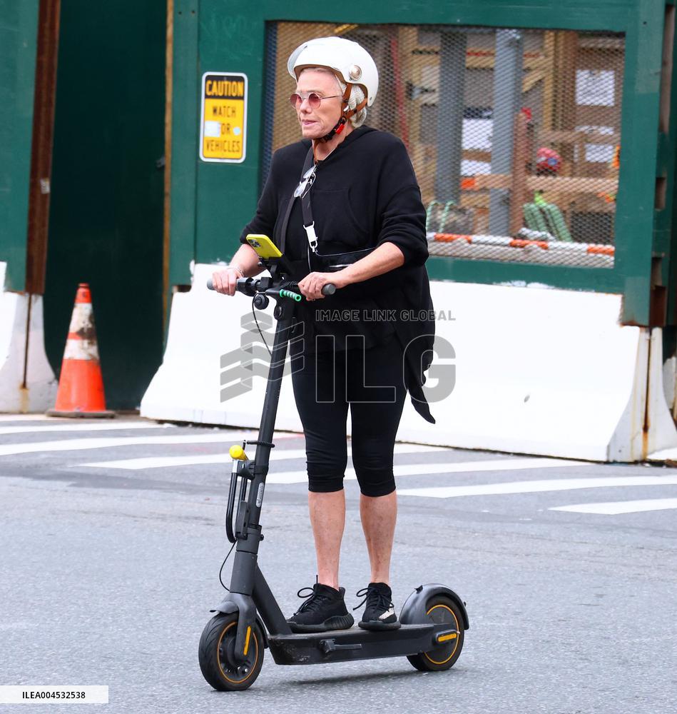 Deborra-Lee Furness Riding Her Scooter - NYC