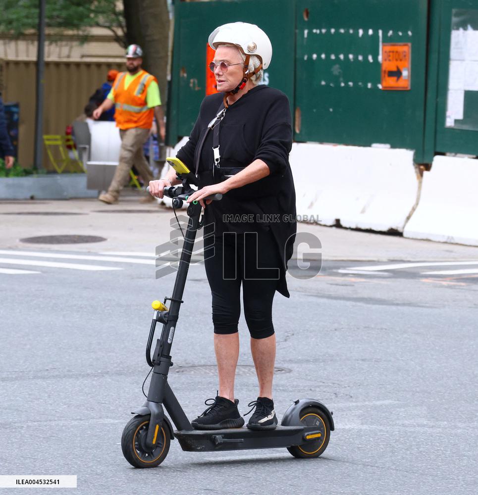 Deborra-Lee Furness Riding Her Scooter - NYC