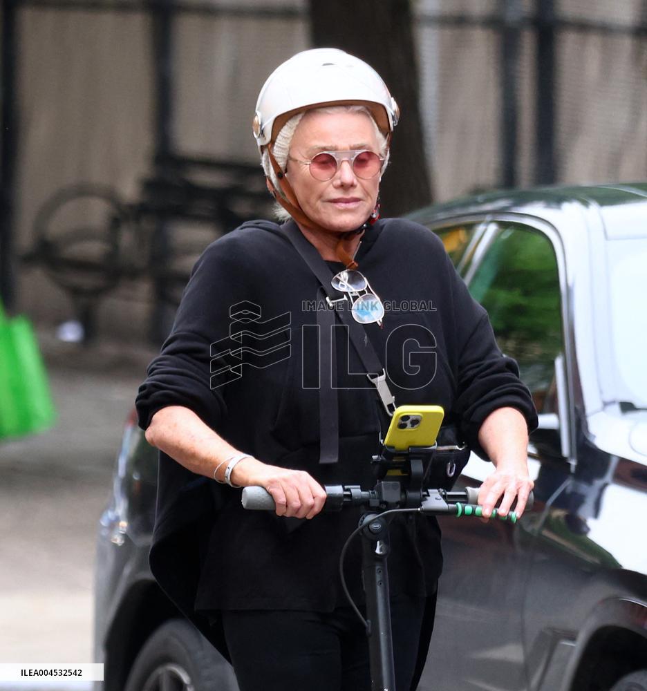 Deborra-Lee Furness Riding Her Scooter - NYC