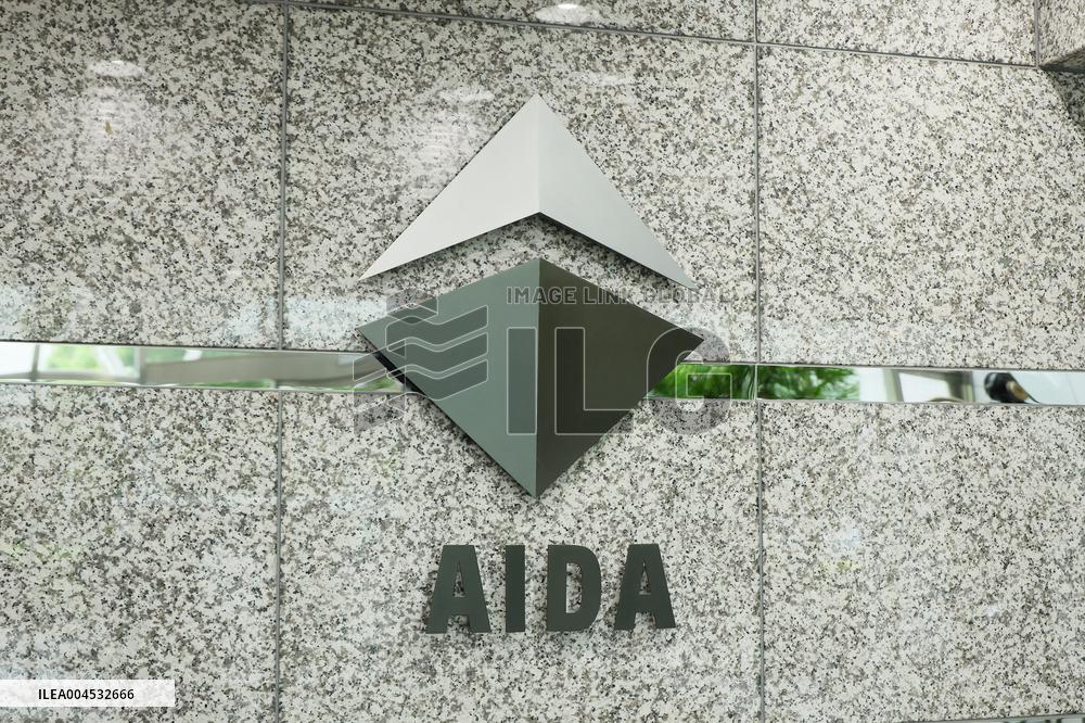AIDA ENGINEERING signage and logo
