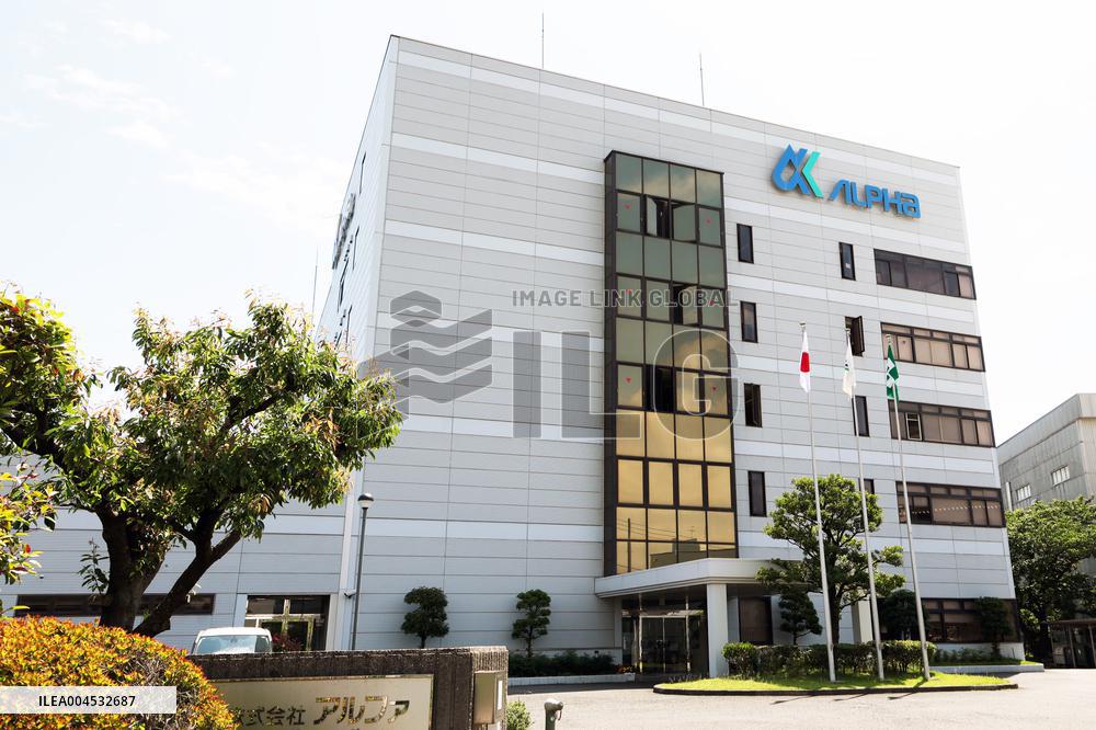 Alpha exterior, logo and signage