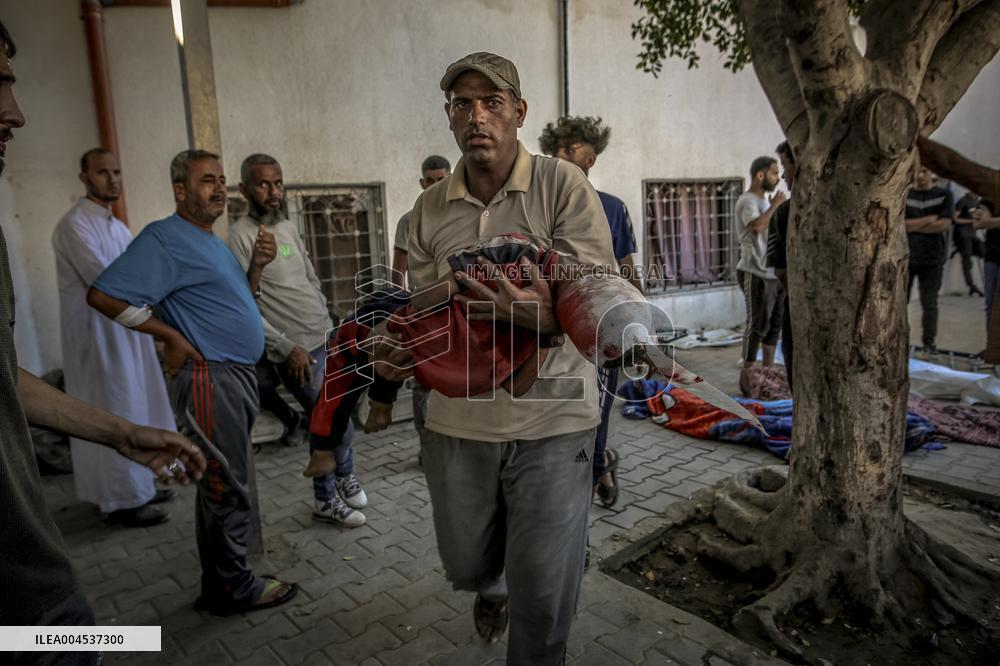 Palestinians Mourn Airstrike Victims at Al-Shifa Hospital - Gaza