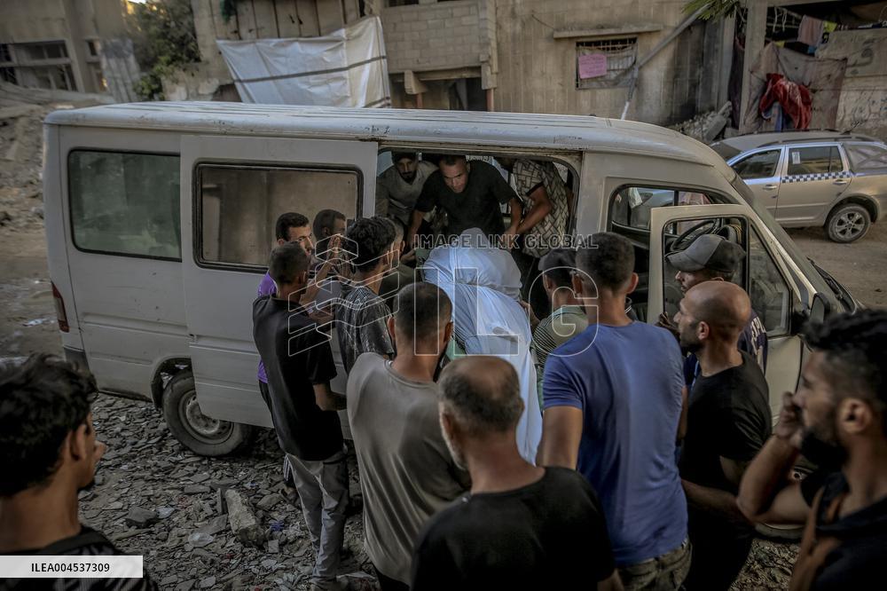 Palestinians Mourn Airstrike Victims at Al-Shifa Hospital - Gaza