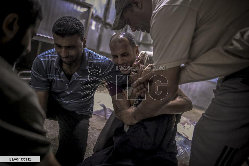 Palestinians Mourn Airstrike Victims at Al-Shifa Hospital - Gaza