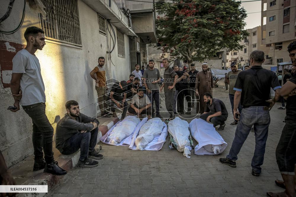 Palestinians Mourn Airstrike Victims at Al-Shifa Hospital - Gaza