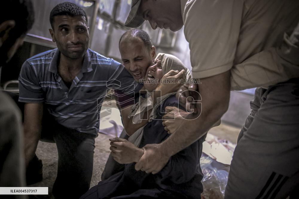 Palestinians Mourn Airstrike Victims at Al-Shifa Hospital - Gaza