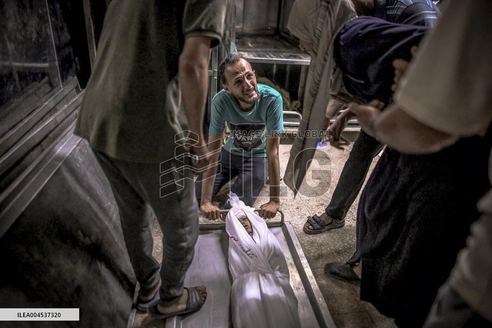 Palestinians Mourn Airstrike Victims at Al-Shifa Hospital - Gaza