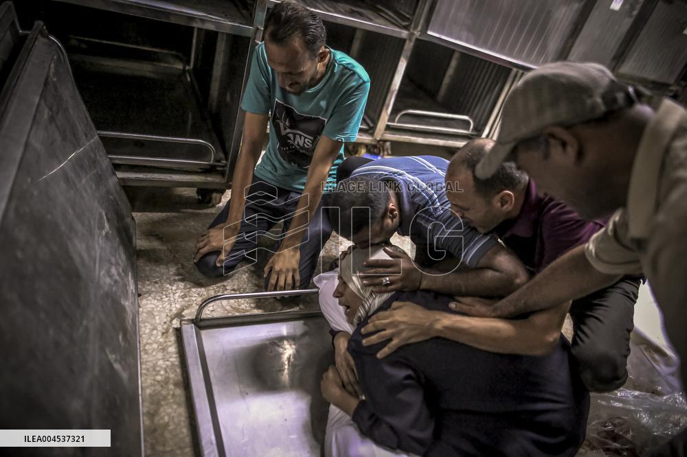 Palestinians Mourn Airstrike Victims at Al-Shifa Hospital - Gaza