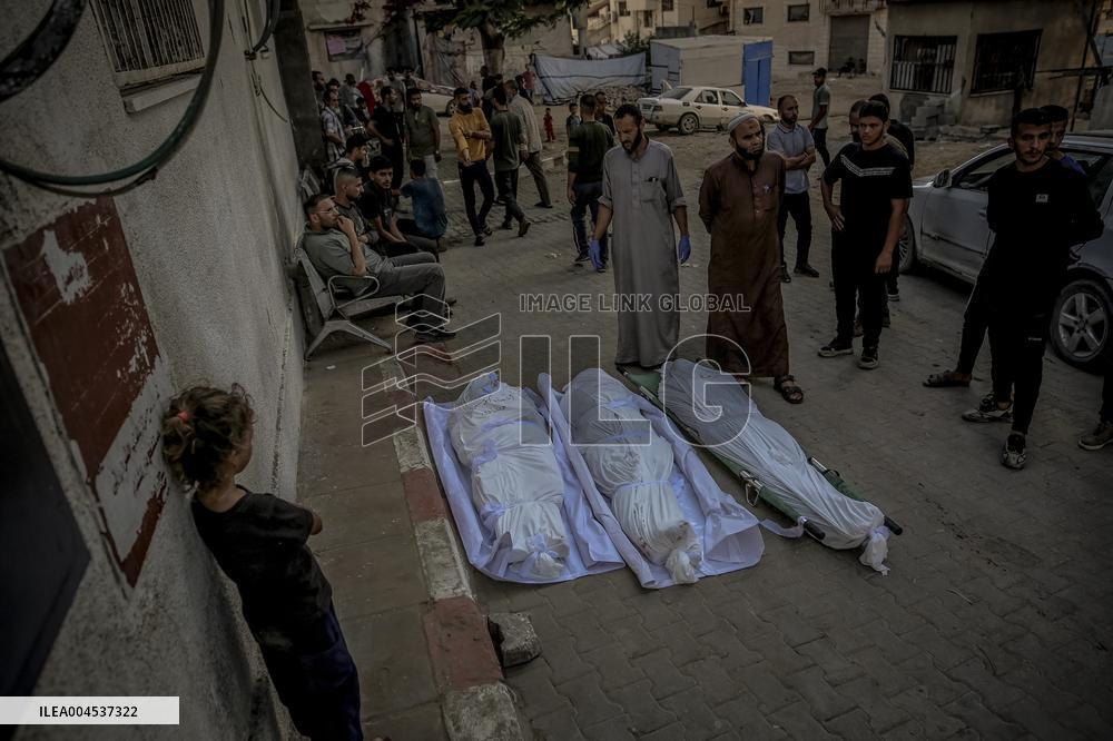 Palestinians Mourn Airstrike Victims at Al-Shifa Hospital - Gaza