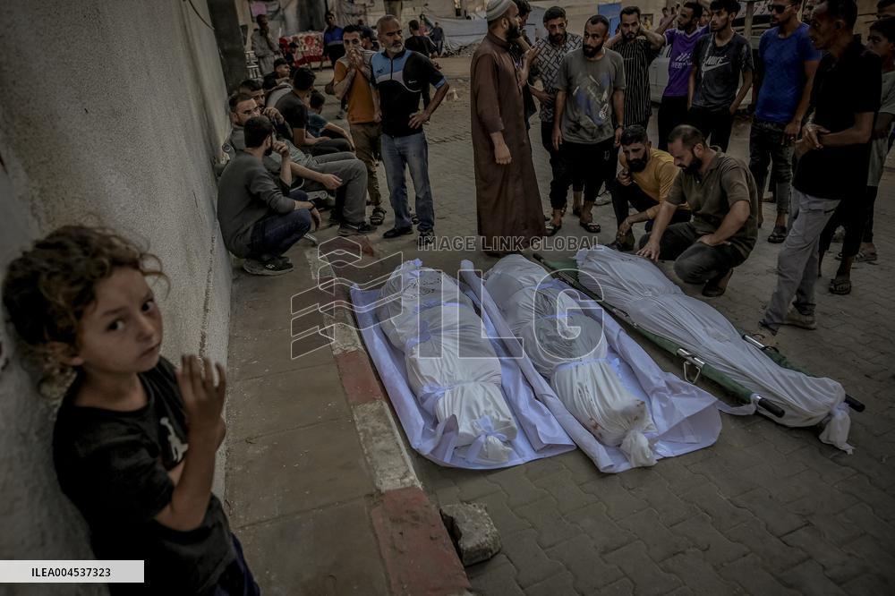 Palestinians Mourn Airstrike Victims at Al-Shifa Hospital - Gaza