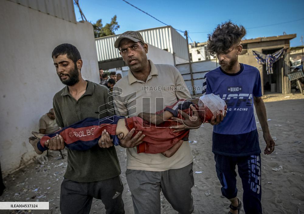 Palestinians Mourn Airstrike Victims at Al-Shifa Hospital - Gaza
