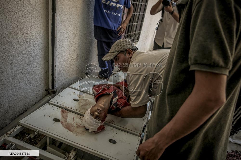 Palestinians Mourn Airstrike Victims at Al-Shifa Hospital - Gaza