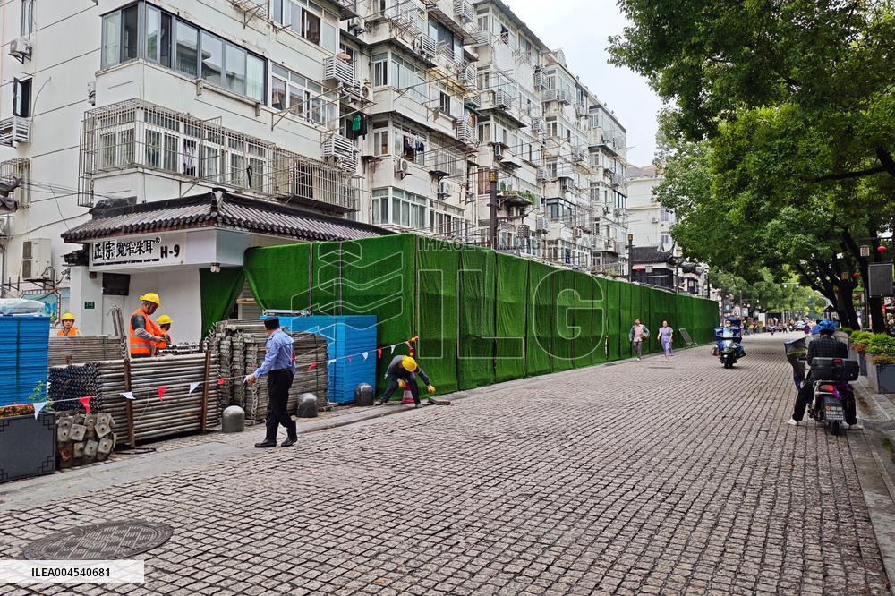 Rainstorm Damages Storefronts in Shanghai