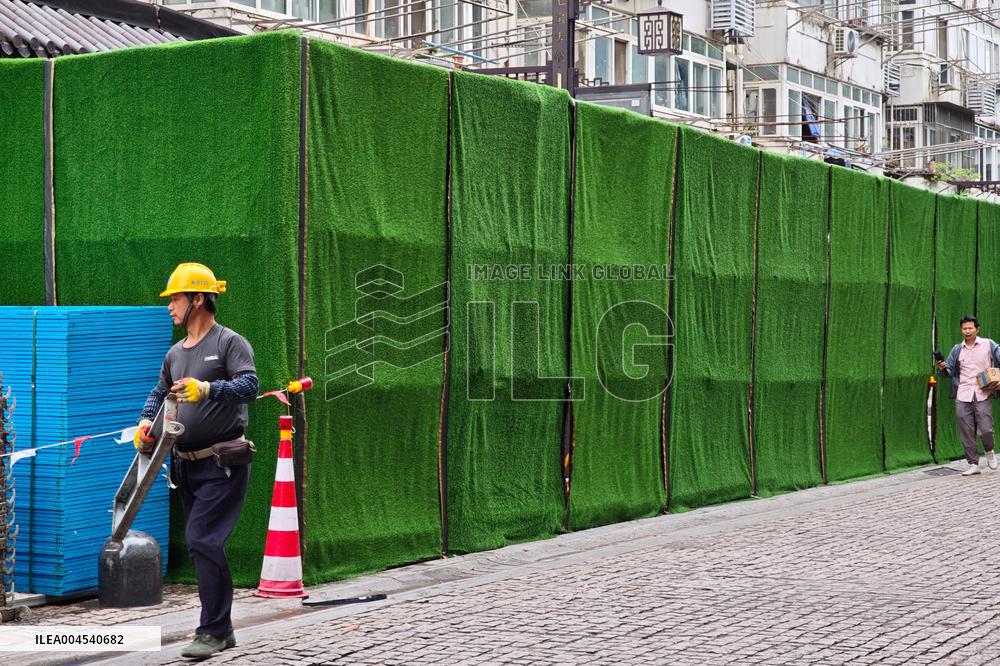Rainstorm Damages Storefronts in Shanghai