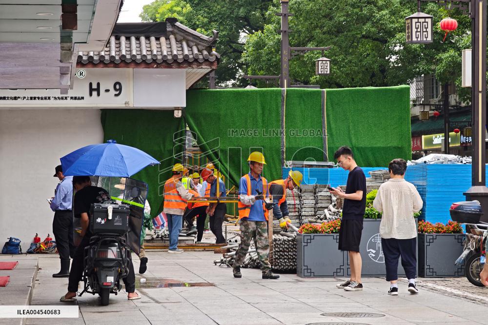 Rainstorm Damages Storefronts in Shanghai