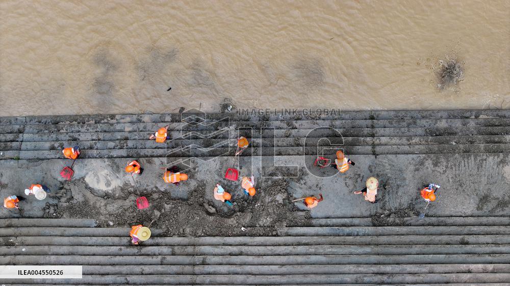 Clearing Silt After Flood in Rong'an