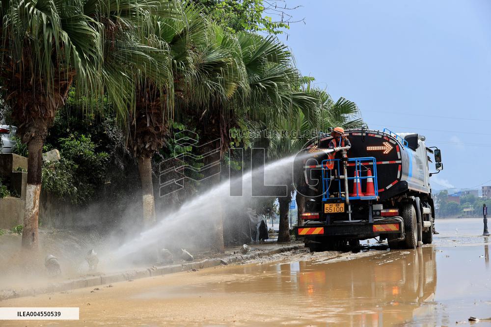Clearing Silt After Flood in Rong'an